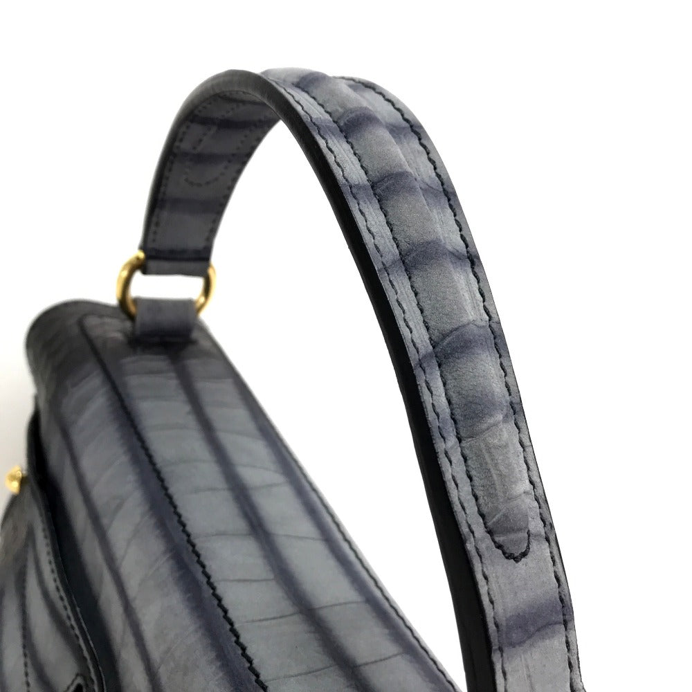 YVES SAINT LAURENT Nubuck crocodile embosed Muse toe