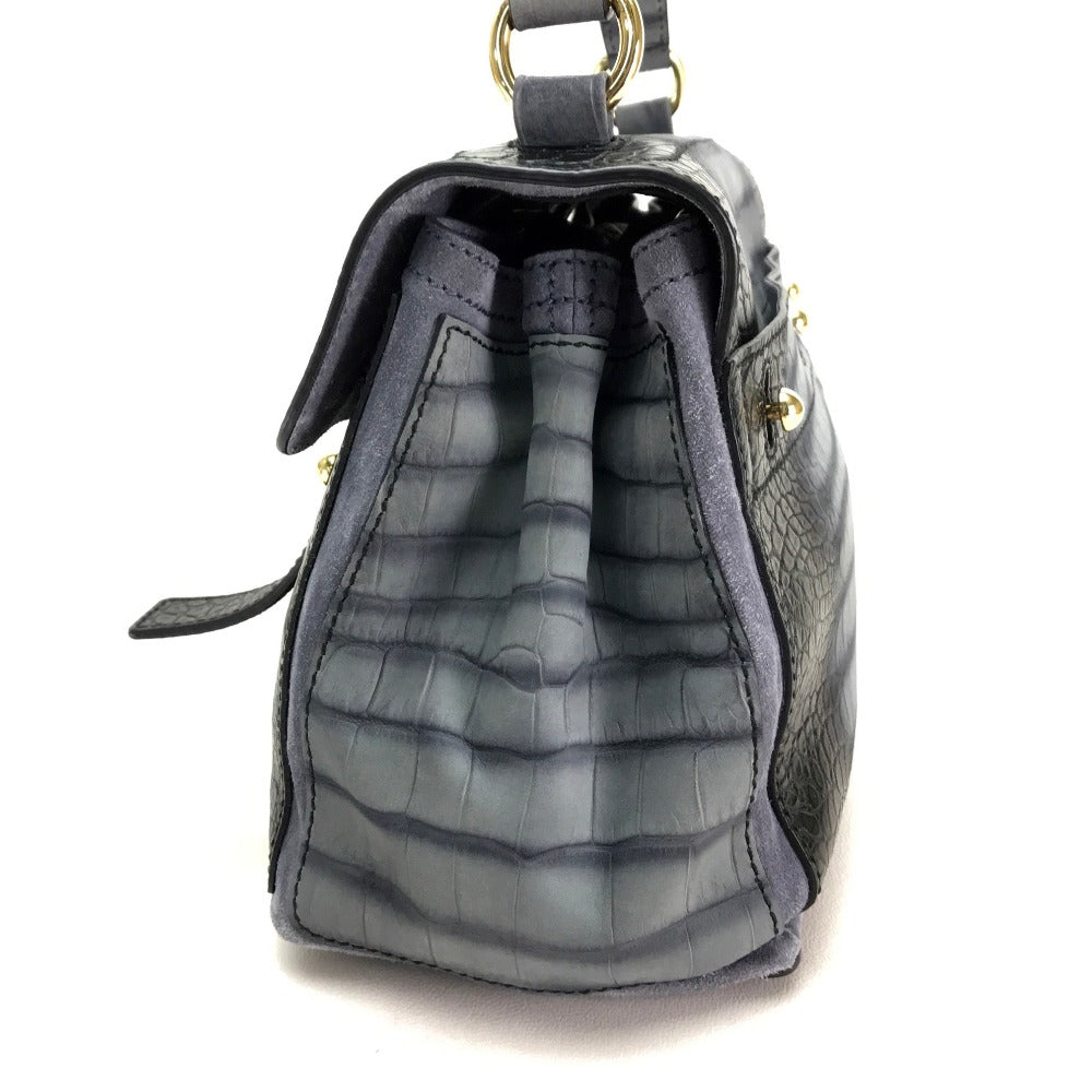 YVES SAINT LAURENT Nubuck crocodile embosed Muse toe