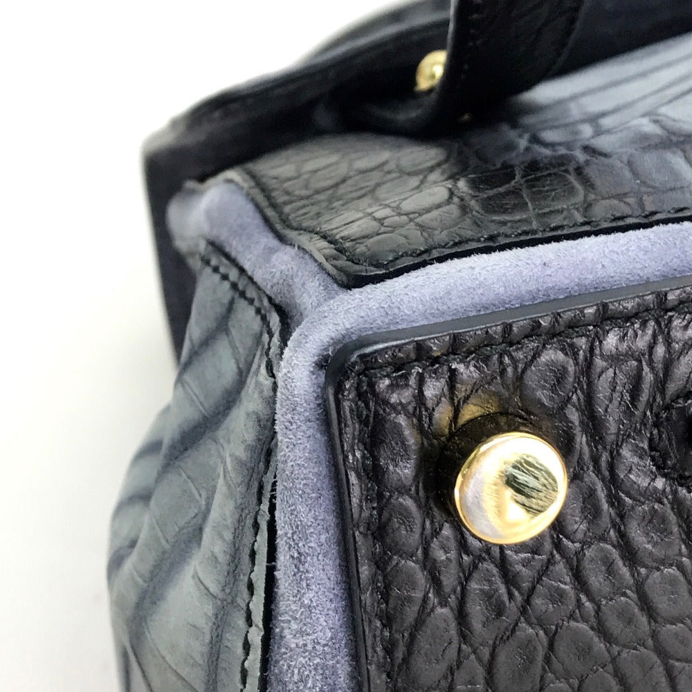 YVES SAINT LAURENT Nubuck crocodile embosed Muse toe